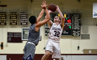 Joey Sponheim pulls up for the fade-away jumper against Whittier.