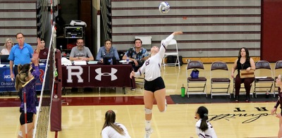 Maloree Kupp goes up for a kill against Whittier.