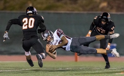 Nathan Martinez reaches the end zone against Oxy (Photo credit: Charles Blackburn)
