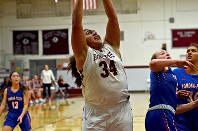 Reyna Ta'amu became the ninth women's basketball player to score 1000 points in her career.
