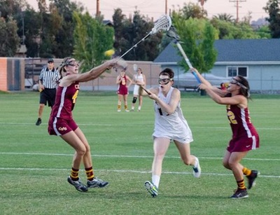 KK McCaslin breaks through the CMS defense for one of her four goals in the win (photo credit: Ellis Hazard).
